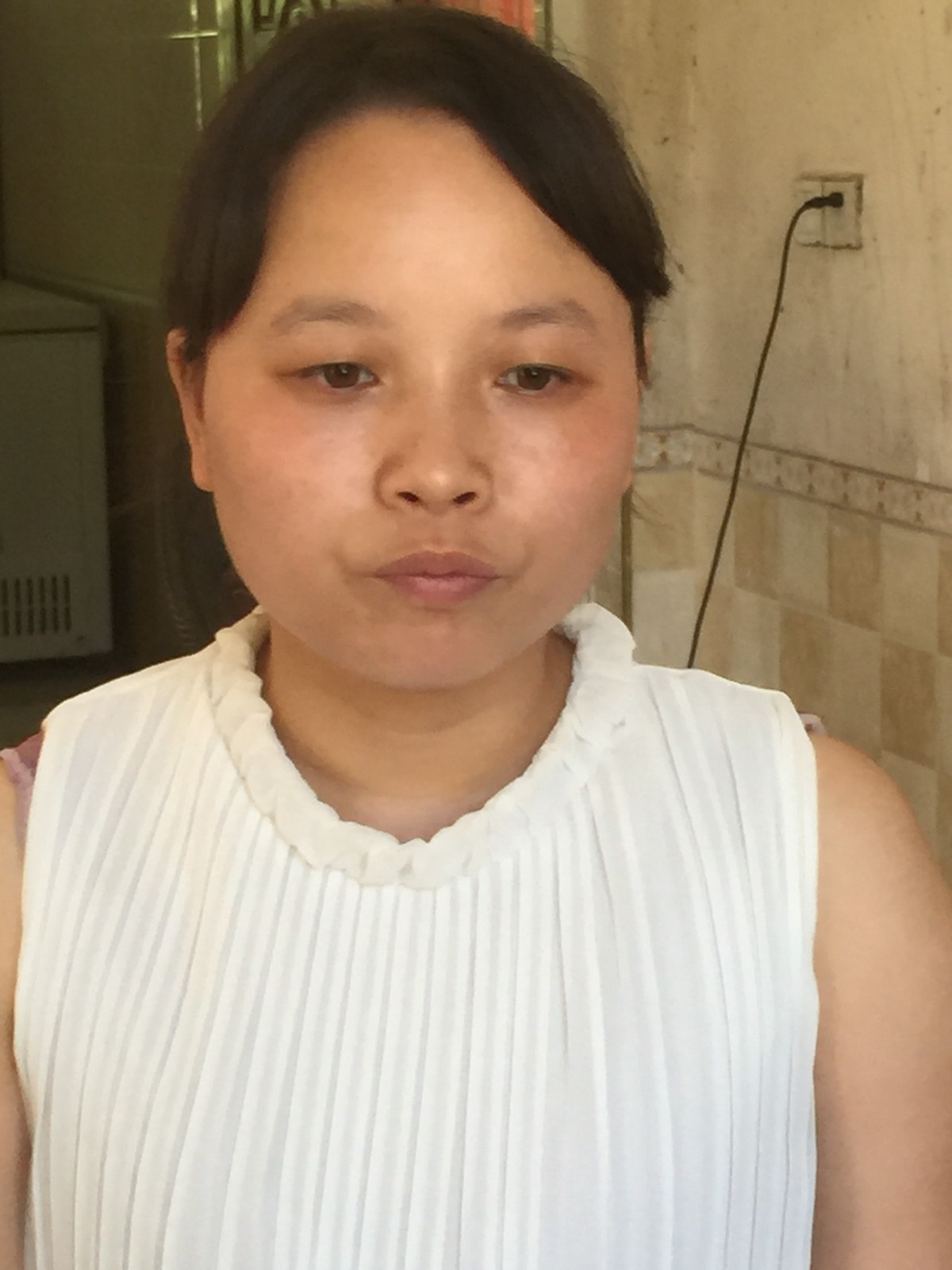 伍华荣妻子.jpg